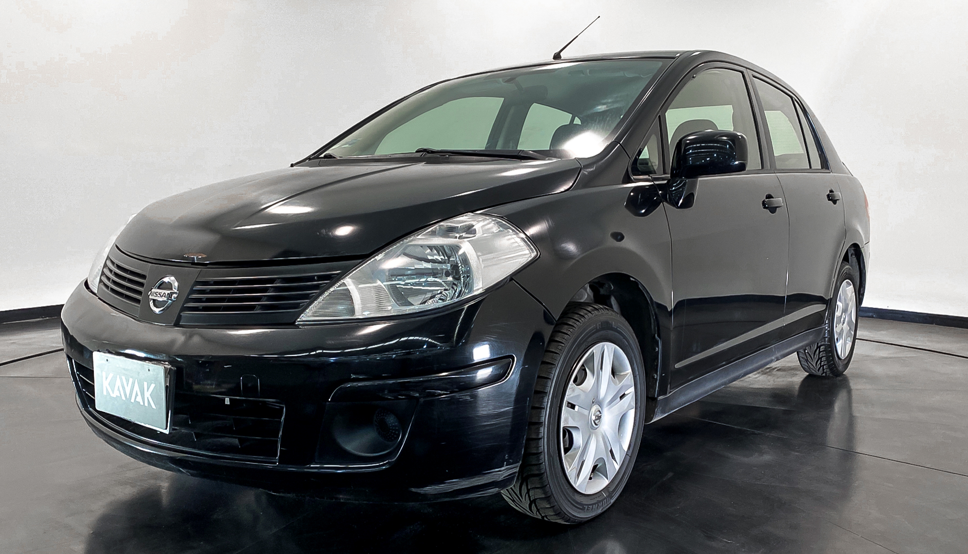 Nissan tiida омыватель фар