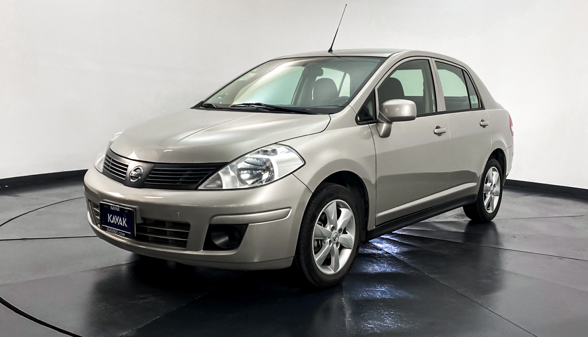 Nissan tiida омыватель фар